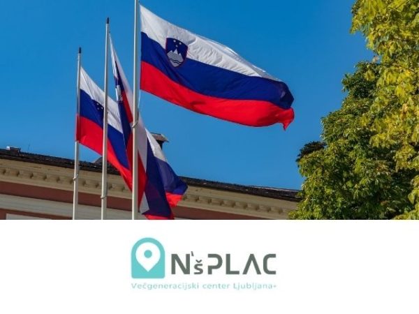 Slovenska zastava, ki plapola v vetru na drogu